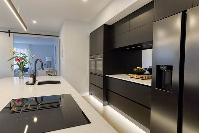 6. Sleek Contemporary Kitchen with Black Wall Cabinets - white and black kitchen ideas