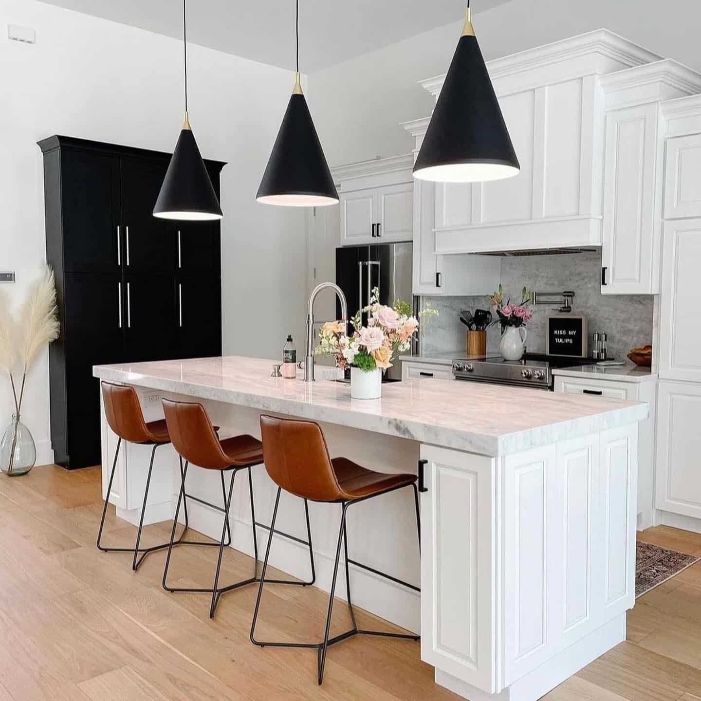 9. Bright White Kitchen with Black Pendant Lighting - white and black kitchen ideas