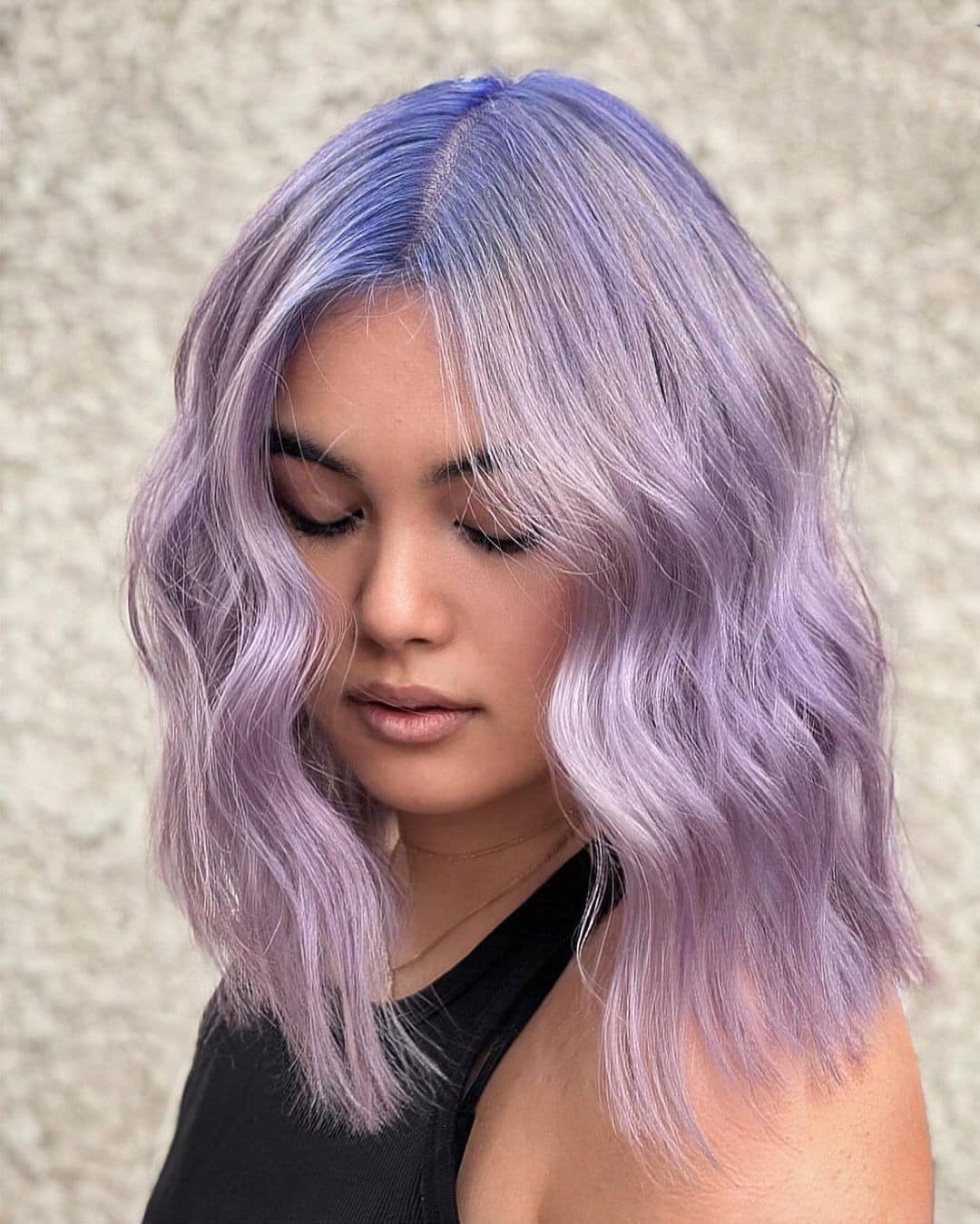 4. Dusty Lilac Shoulder-Length Waves - Light Purple Hair Color
