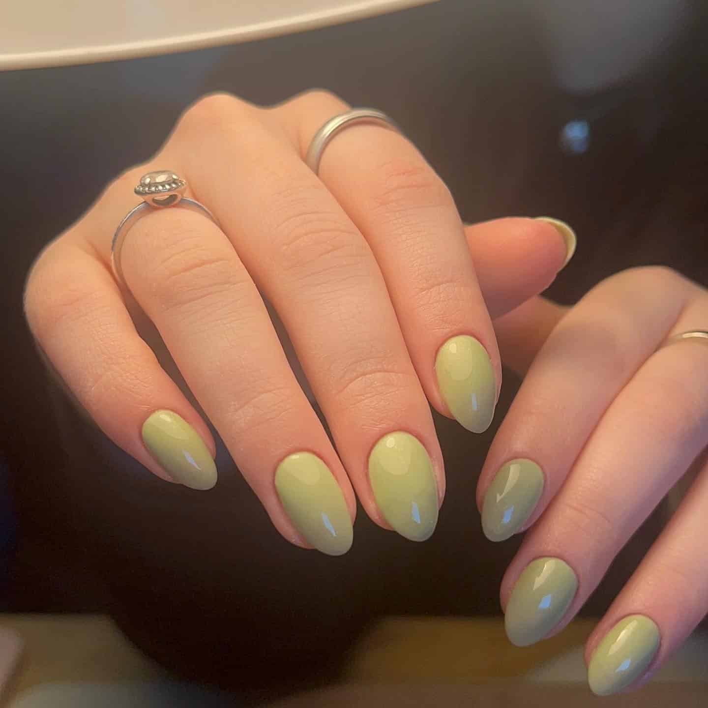 2. Soft Sage Gloss Almond Nails - saint patrick's day nail ideas
