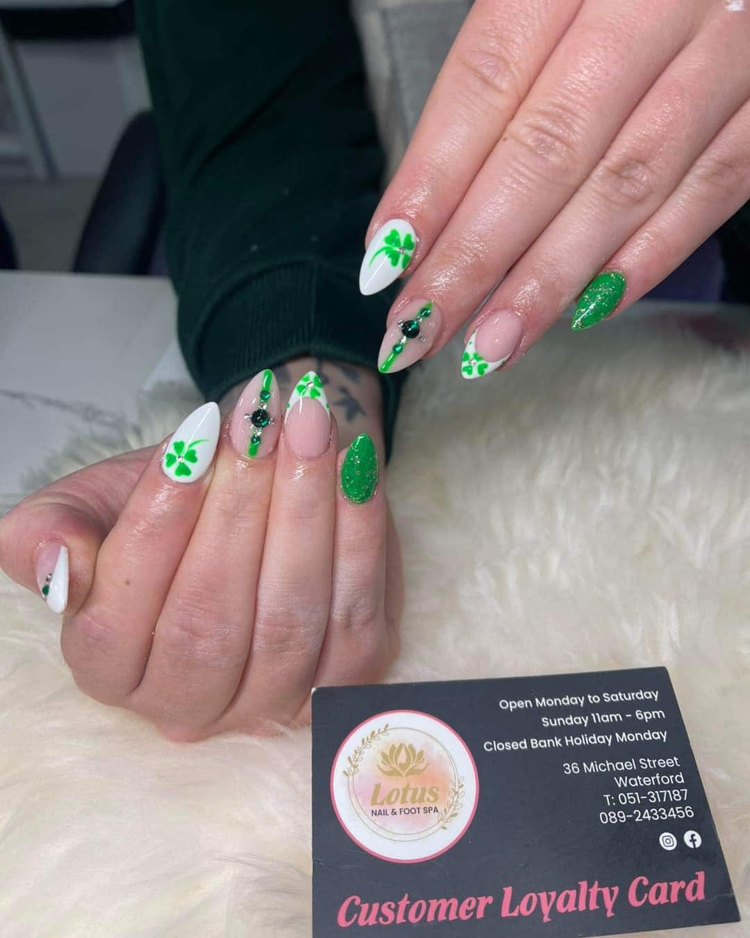 14. Shamrock French Almond Nails with Gems - saint patrick's day nail ideas