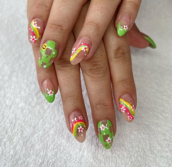 18. Rainbow Clover Accent Almond Nails - saint patrick's day nail ideas