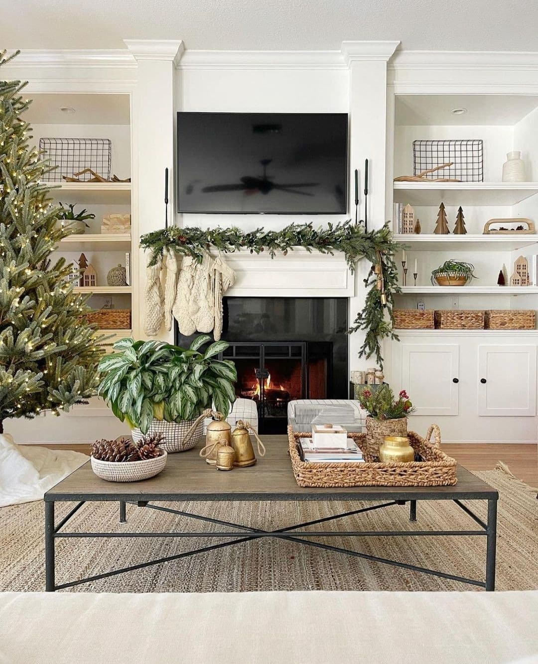 2. Cozy Christmas Living Room with Classic White Fireplace - living room ideas with fireplace