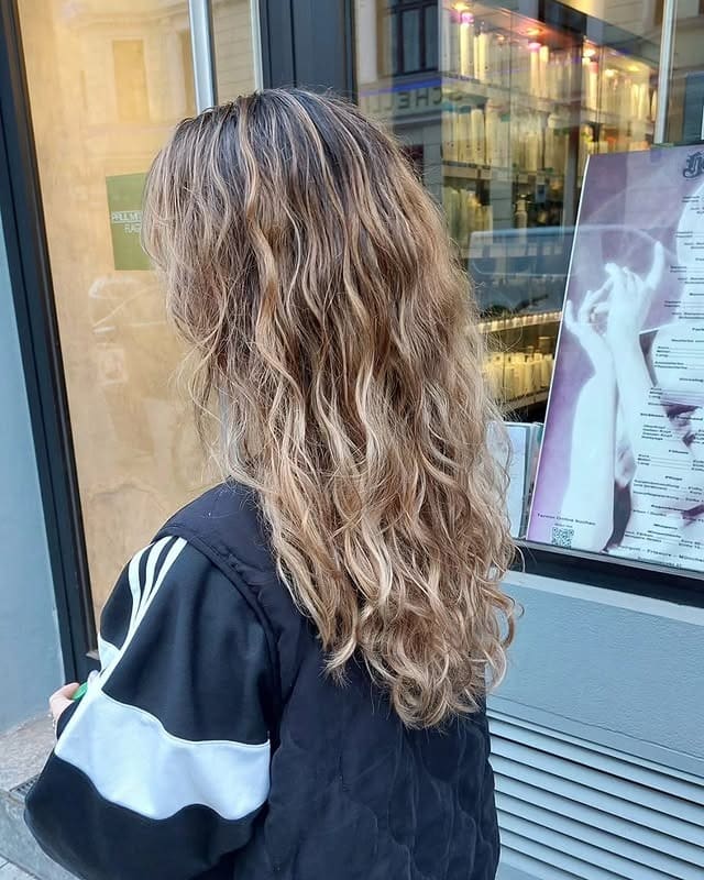 10. Textured Warm Blonde with Natural Movement - Warm Blonde Hair Color