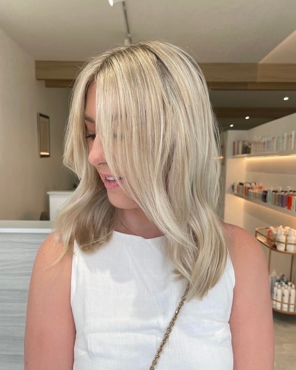11. Soft Platinum Blonde Lob with Airy Layers - Warm Blonde Hair Color