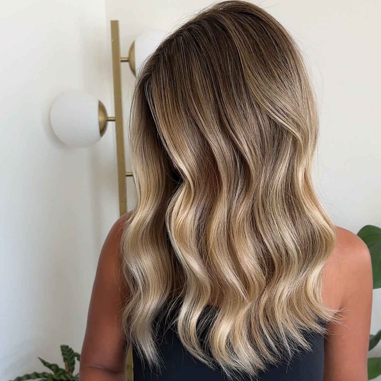 12. Dimensional Beige Blonde Balayage Waves - Warm Blonde Hair Color