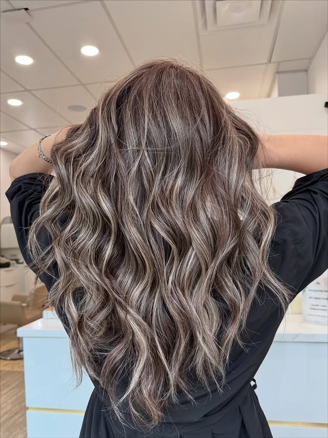 10. Cool Brunette Beach Waves with Subtle Highlights - Cool Brown Hair Color