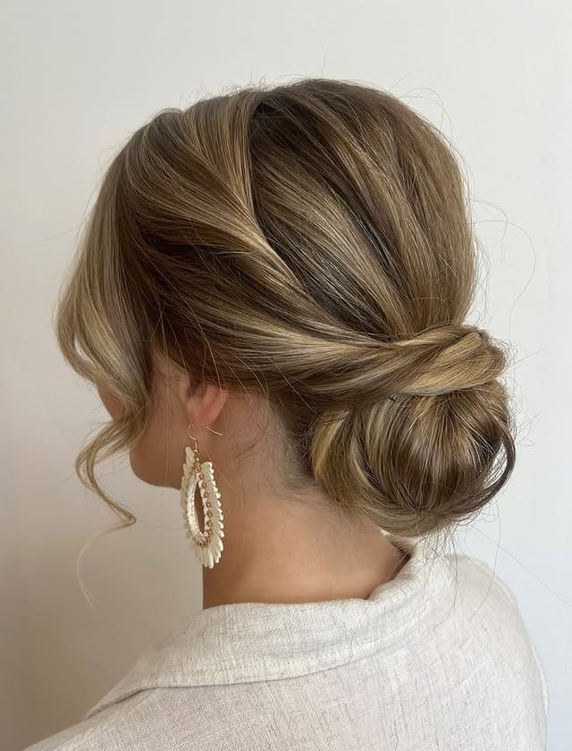 5. Sleek Ash Blonde Low Knot - Updo Hairstyles