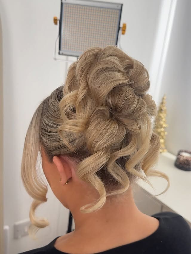 16. Soft Golden Blonde Textured High Updo - Updo Hairstyles