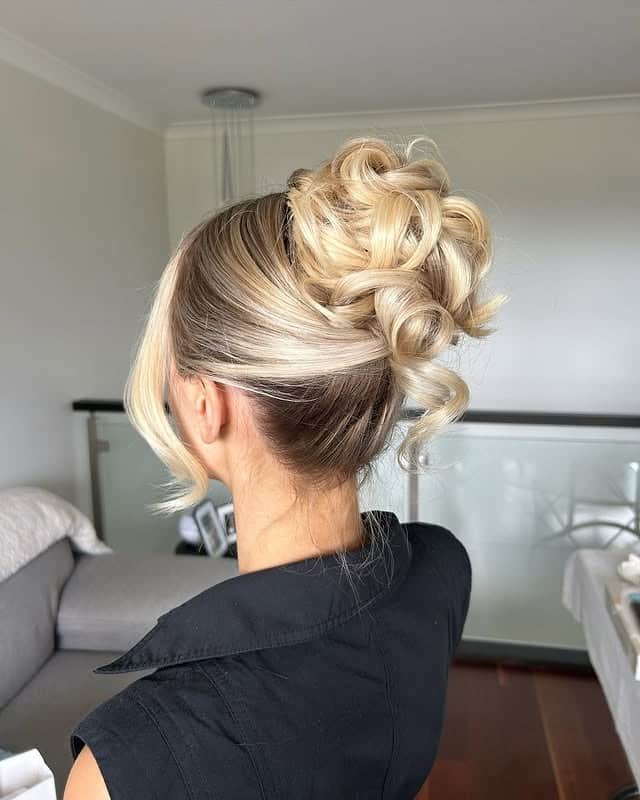18. Sculpted Beige Blonde Twisted Updo with Volume - Updo Hairstyles