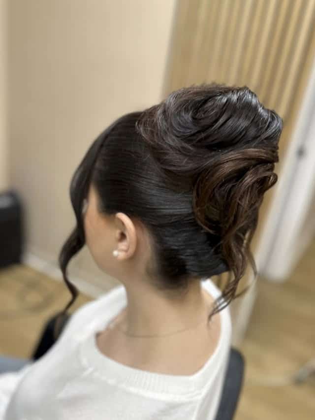 19. Polished Dark Brunette High Twist Updo - Updo Hairstyles