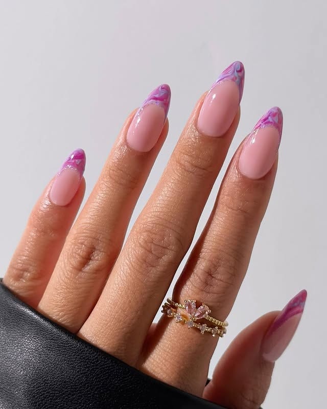 4. Pink and Violet Swirl Almond Nails - short purple nail ideas