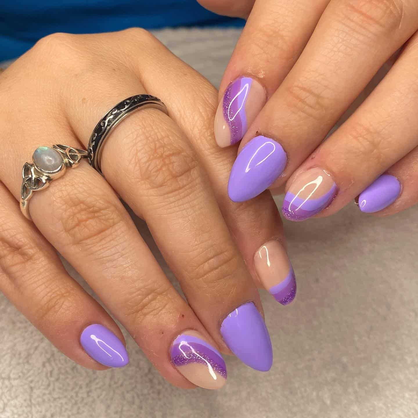 9. Pastel Purple Wave Almond Nails - short purple nail ideas