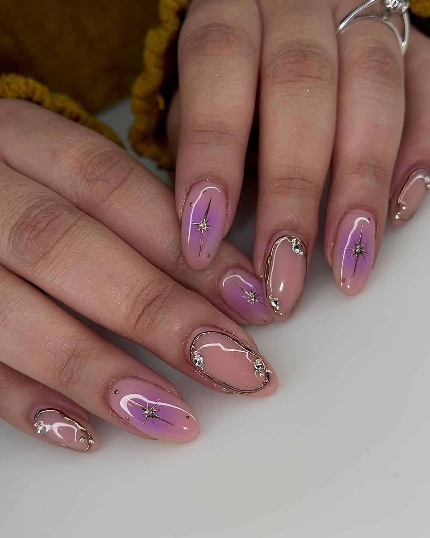14. Pink and Lavender Gradient Almond Nails with Star Accents - short purple nail ideas