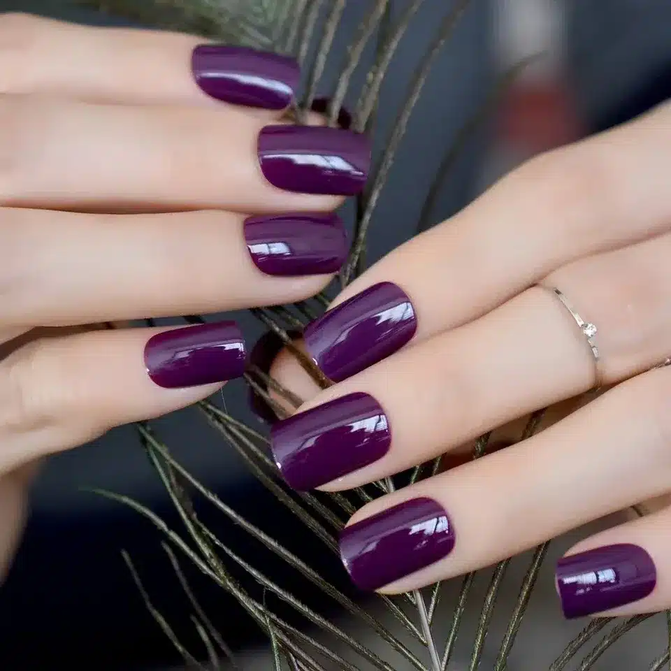 16. Deep Plum Glossy Square Nails - short purple nail ideas