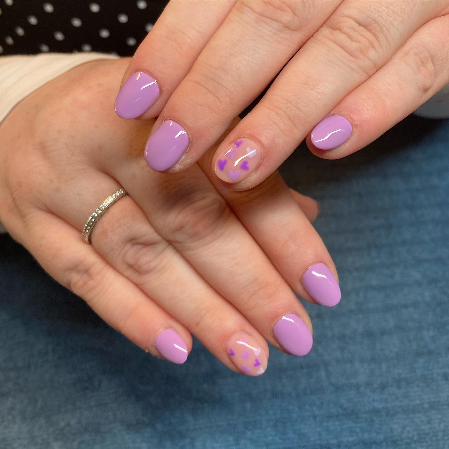 20. Pastel Purple Short Round Nails with Heart Accents - short purple nail ideas