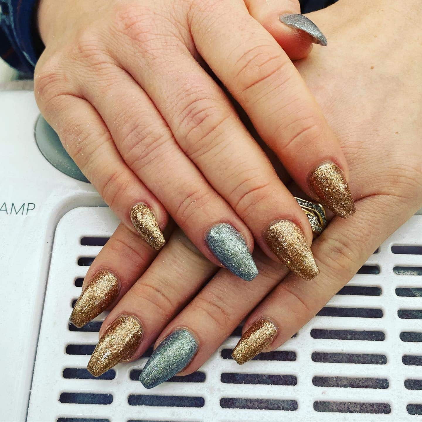 2. Mixed Metallic Gold and Silver Almond Nails - silver and gold nail ideas