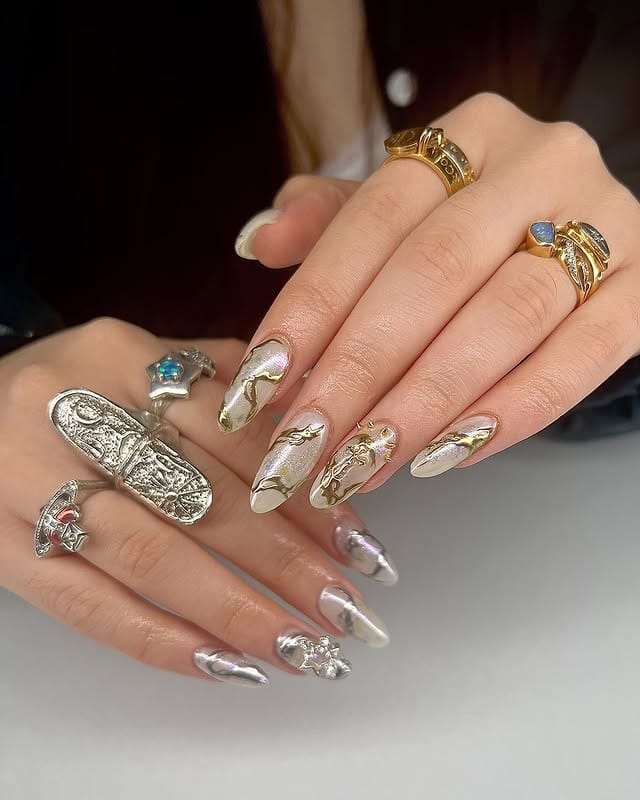 17. Almond Nails with Gold Foil and Chrome Silver Details - silver and gold nail ideas