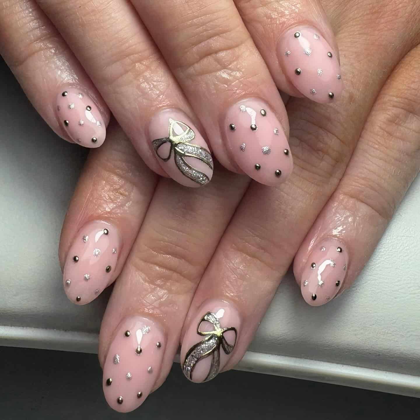 18. Blush Pink Nails with Gold and Silver Stud Accents - silver and gold nail ideas