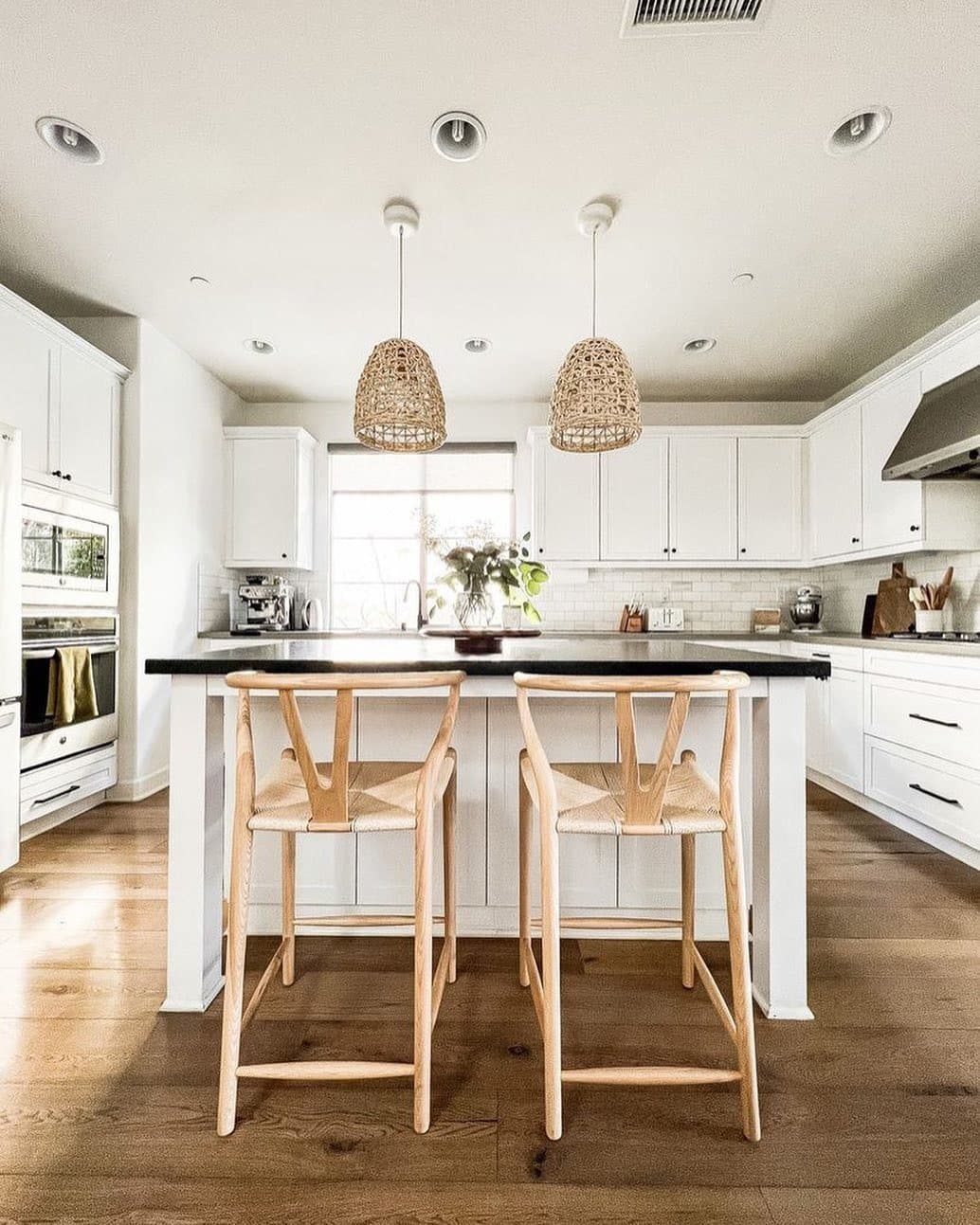 13. Airy Boho Kitchen with White Palette and Woven Lighting - boho kitchen ideas