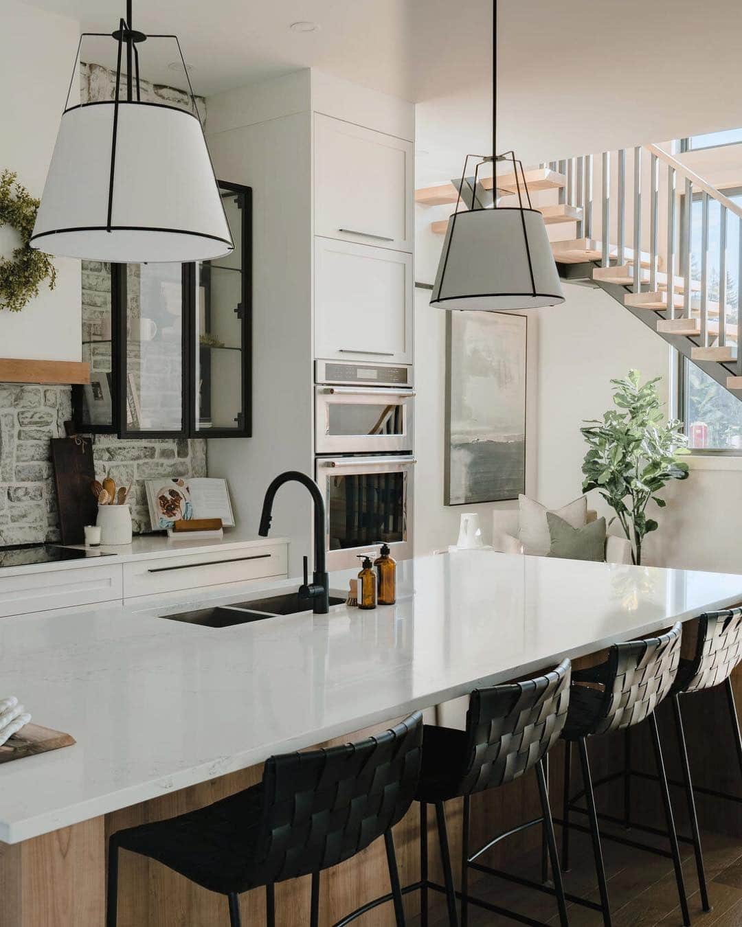 4. Minimal Farmhouse Island with Black Metal Fixtures - farmhouse kitchen island ideas