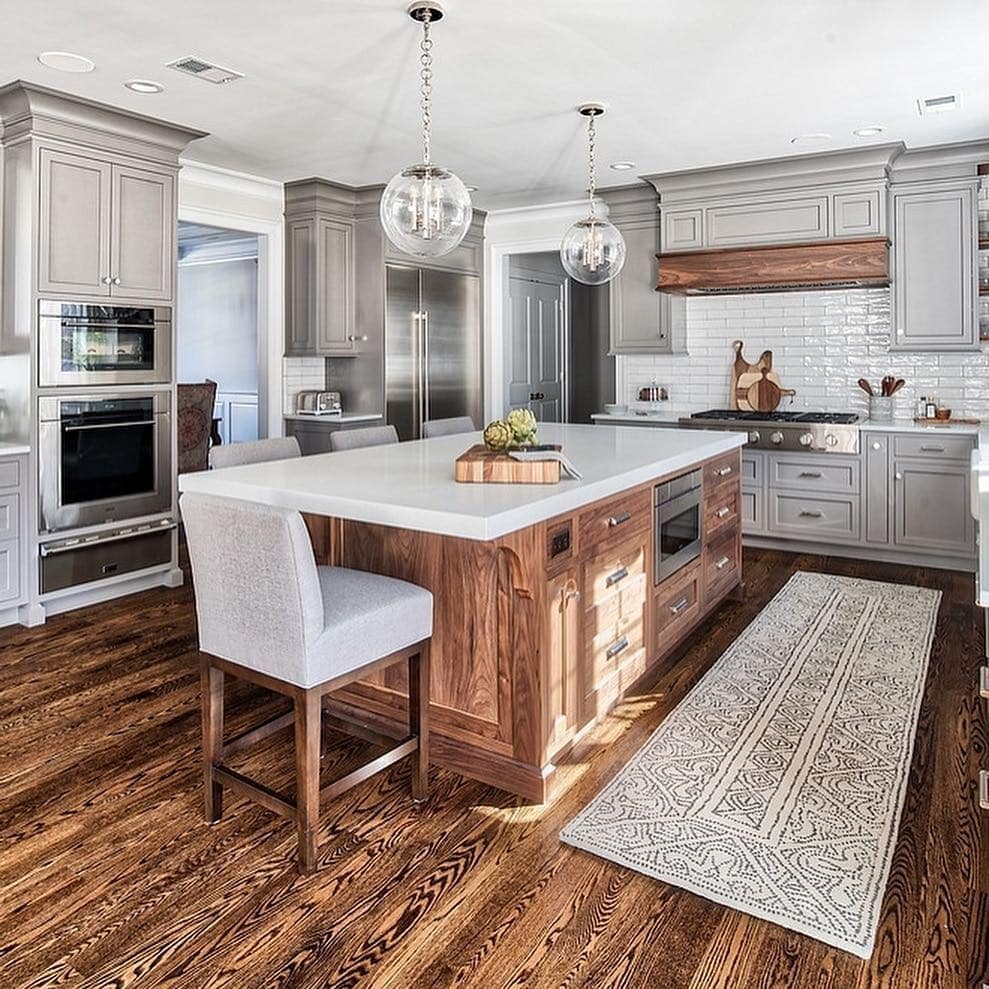 7. Cozy Cottage-Style Island with Butcher Block Top - farmhouse kitchen island ideas