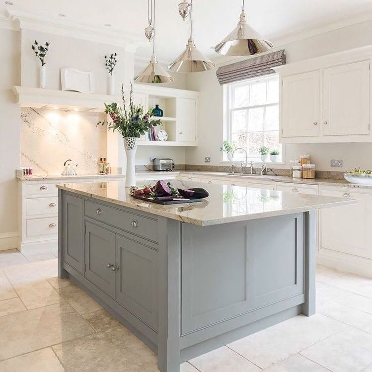 16. Muted Gray Island with Polished Stone Surface - farmhouse kitchen island ideas