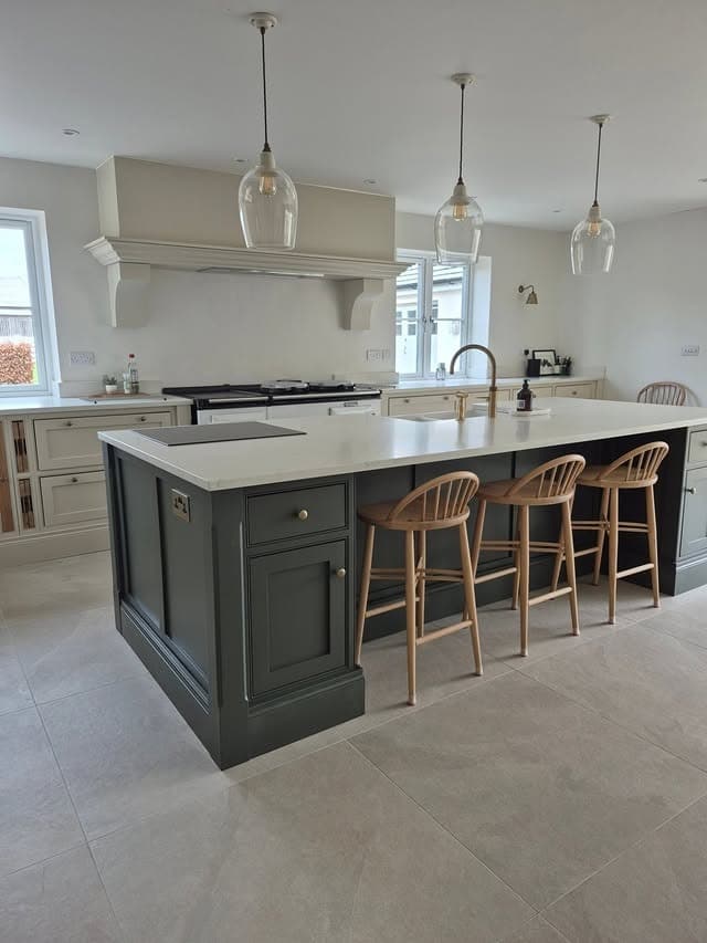 22. Deep Green Island with White Quartz Countertop and Natural Wood Seating - farmhouse kitchen island ideas