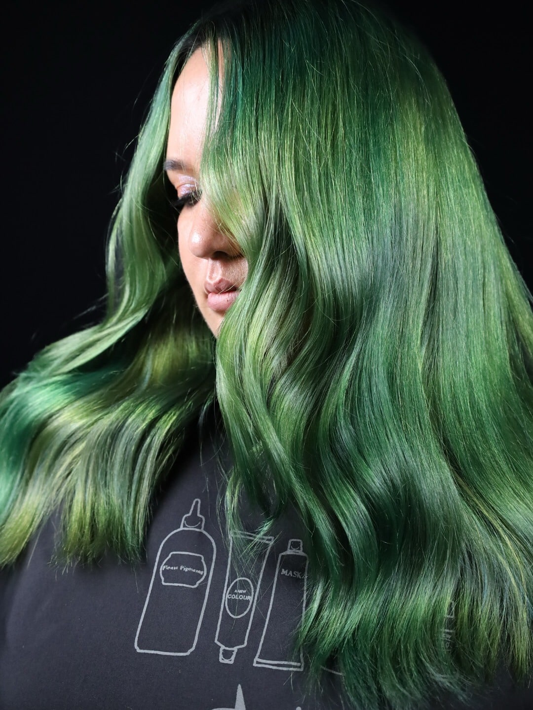 10. Glossy Olive Green Long Waves - Green Hair Color
