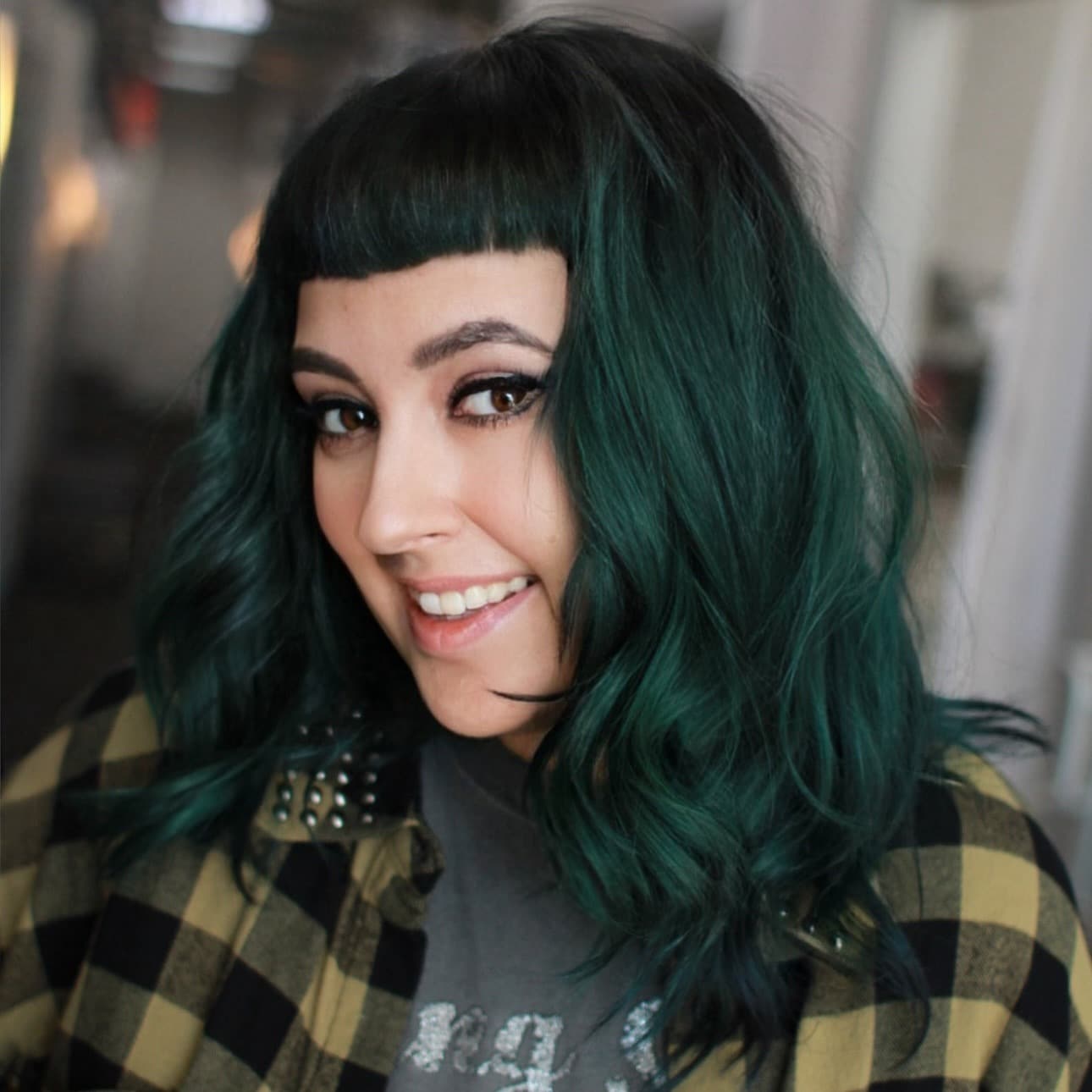 14. Emerald Shag with Blunt Micro Fringe - Green Hair Color