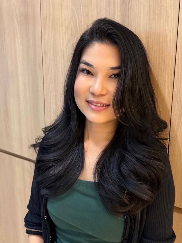 7. Textured Layered Perm with Soft Black - Perm Hairstyles