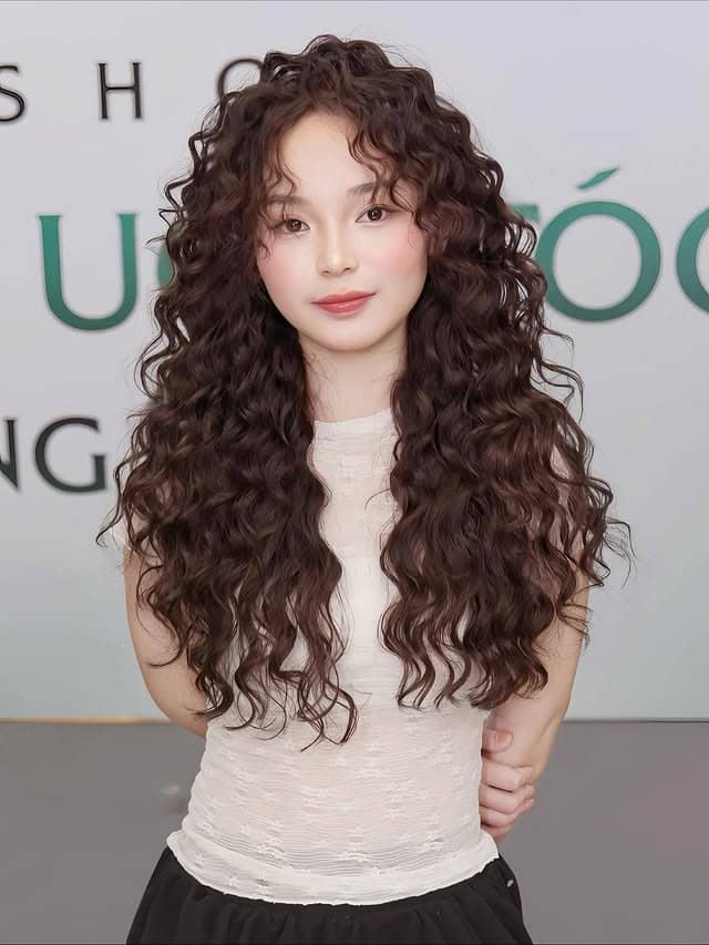 21. Tight Spiral Perm with Deep Mahogany Brown - Perm Hairstyles