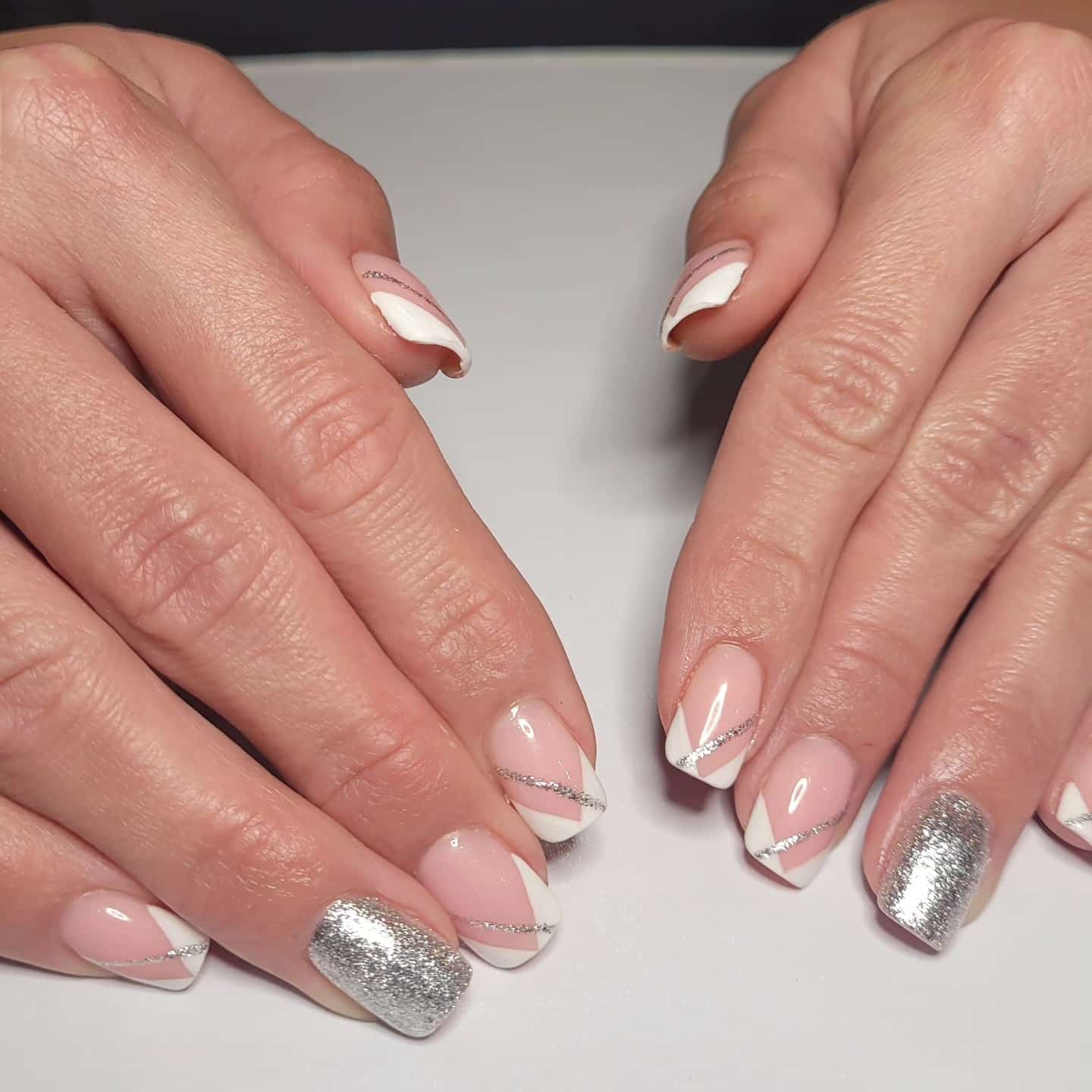 2. Soft Pink and White Diagonal French with Silver Lines - silver and white nail ideas