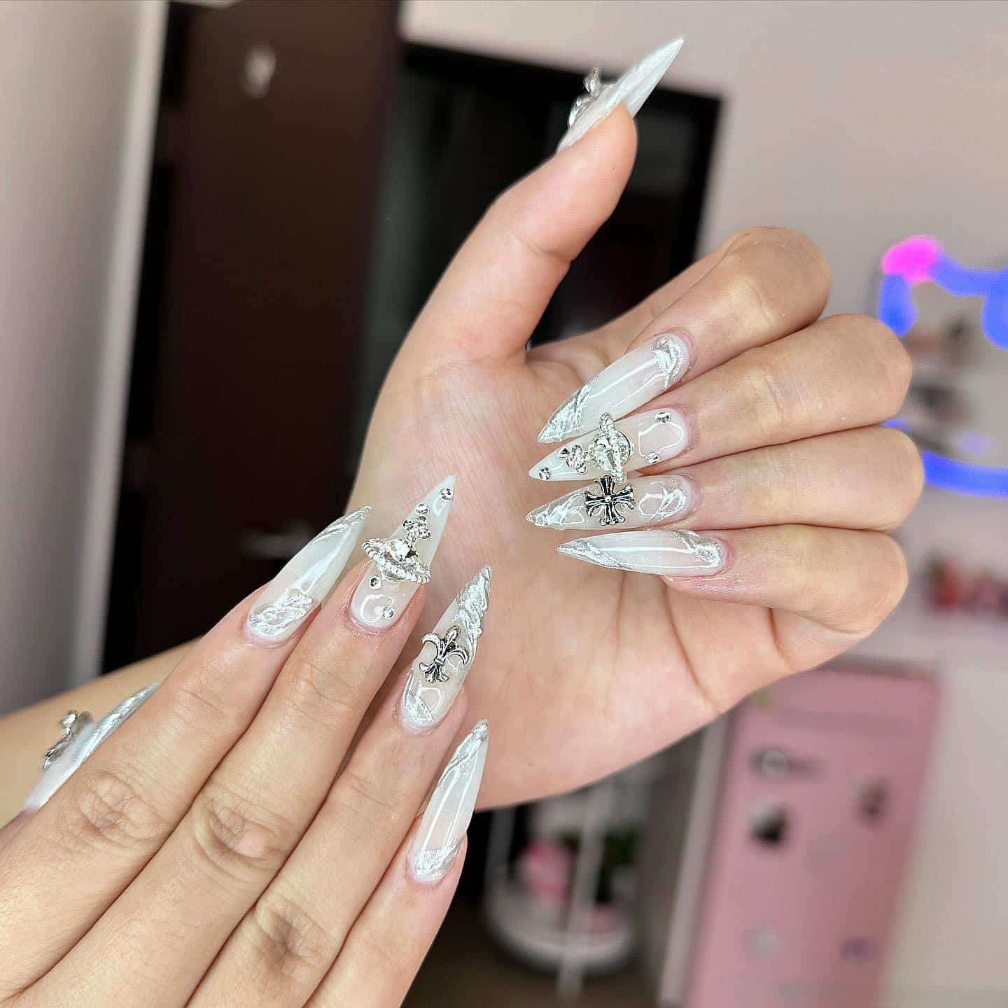 14. Long Stiletto White Chrome and Crystal Embellished Nails - silver and white nail ideas