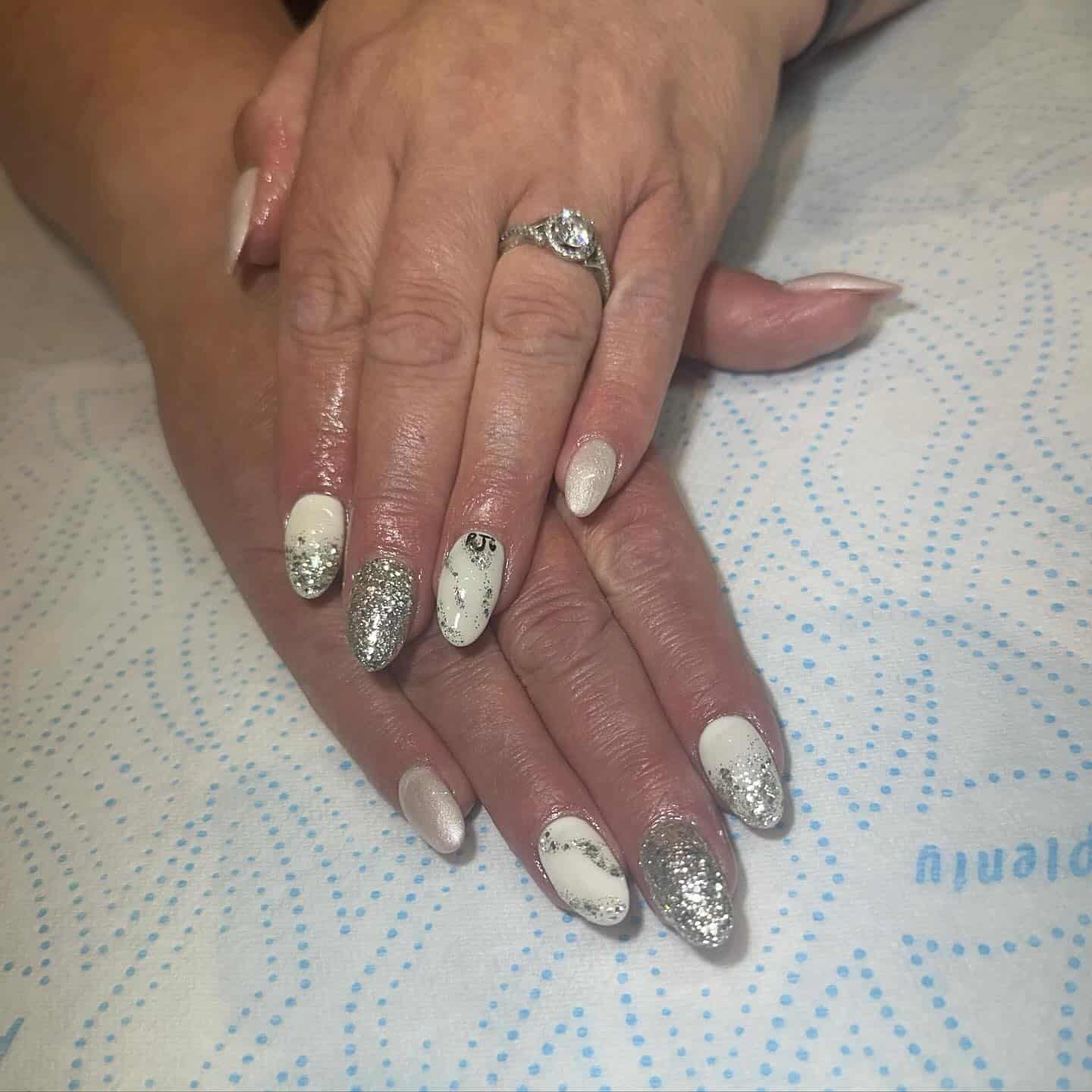 17. White and Silver Glitter Ombre Almond Nails - silver and white nail ideas
