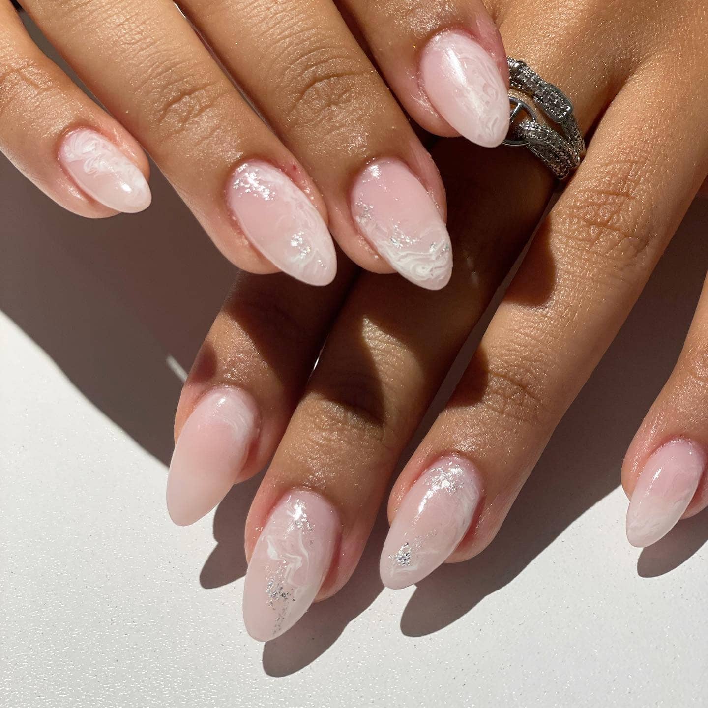 18. Milky Pink and White Marble Nails with Silver Foil - silver and white nail ideas