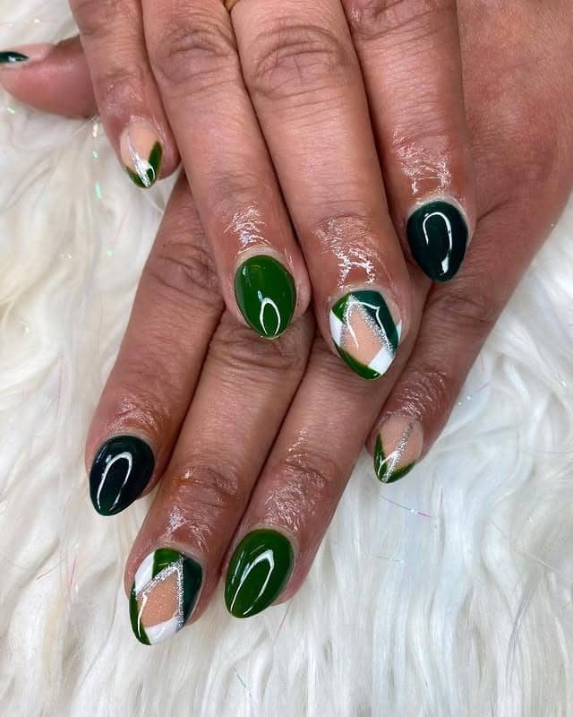 11. Deep Green Gloss Almond Nails with Abstract Nude Accents - simple green nail ideas