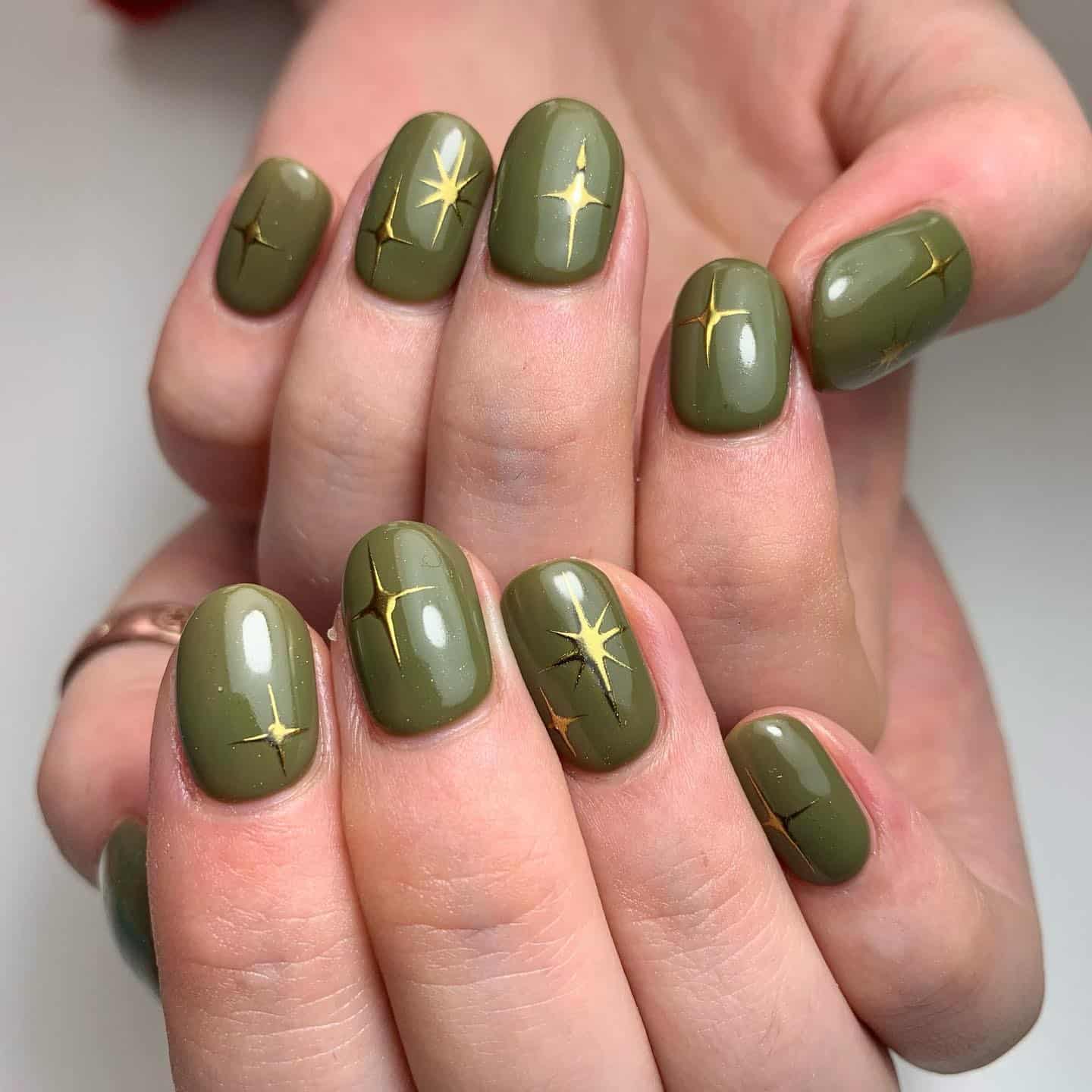 18. Olive Green Short Square Nails with Gold Star Accents - simple green nail ideas