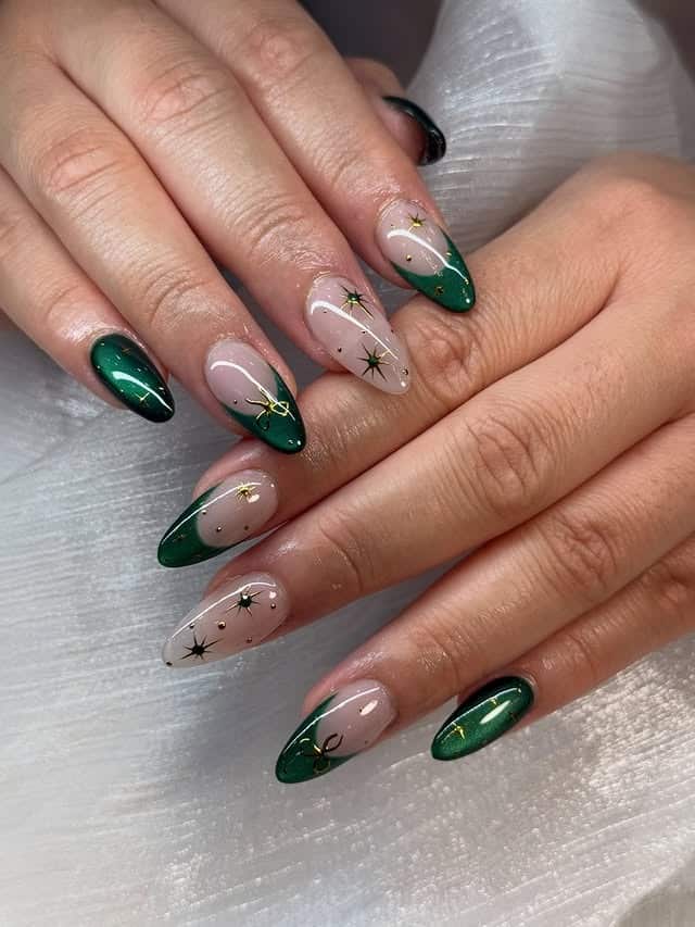21. Emerald Green French Tip Almond Nails with Gold Star Accents - simple green nail ideas