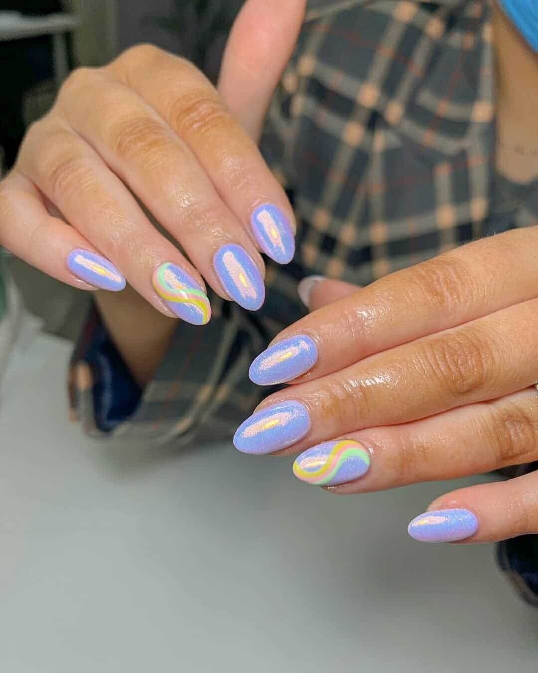 3. Iridescent Lavender Swirl Accent Nails - simple pastel nail ideas