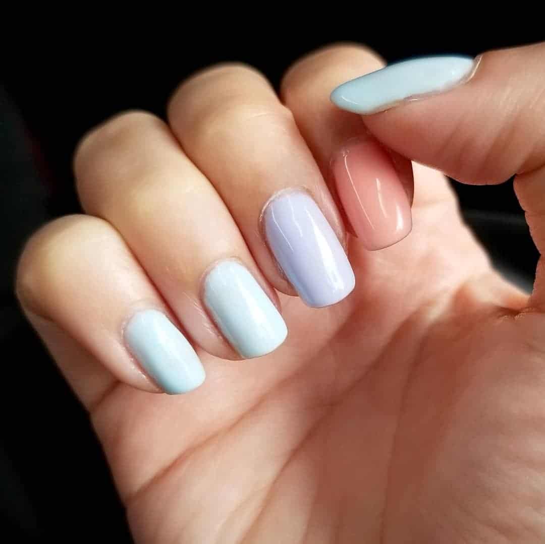 6. Soft Blue and Lilac Gloss Short Nails - simple pastel nail ideas