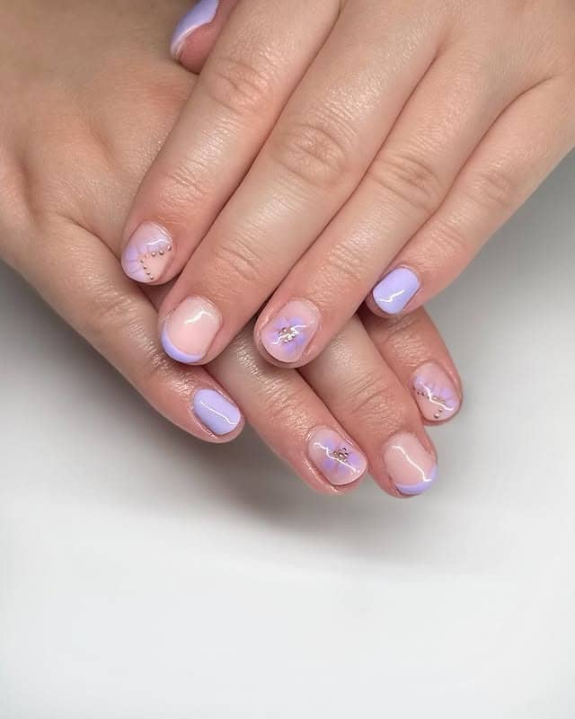 21. Soft Lilac French Tip Short Nails with Gold Detailing - simple pastel nail ideas