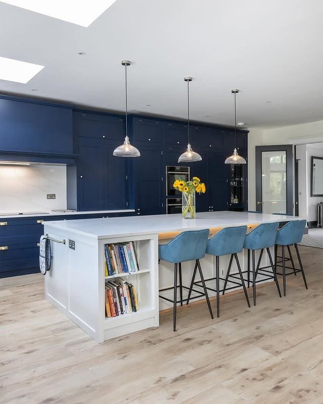 3. Classic Navy Island Kitchen with Light Flooring - blue kitchen ideas