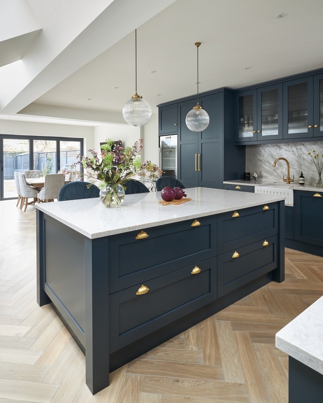 10. Elegant Blue Kitchen Island with Statement Hardware - blue kitchen ideas