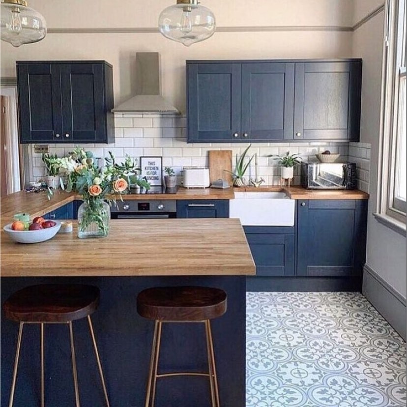 13. Dark Blue Kitchen with Warm Wood Worktops - blue kitchen ideas