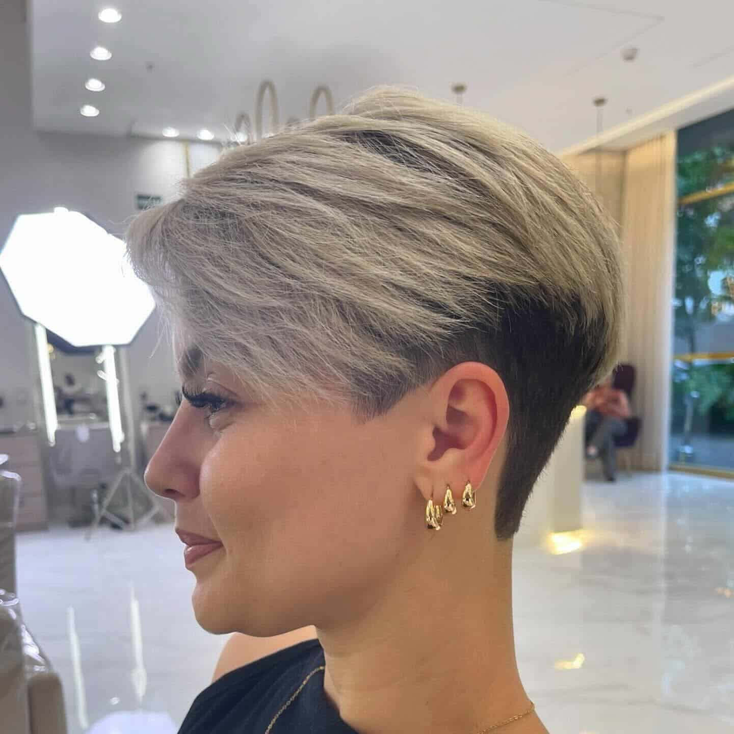 4. Undercut Pixie in Cool Silver Blonde - Layered Pixie Haircuts
