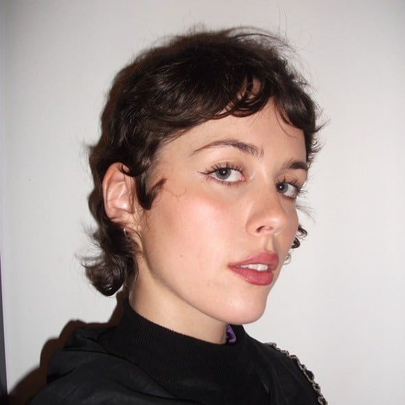 14. Soft Shaggy Pixie in Deep Brunette - Layered Pixie Haircuts