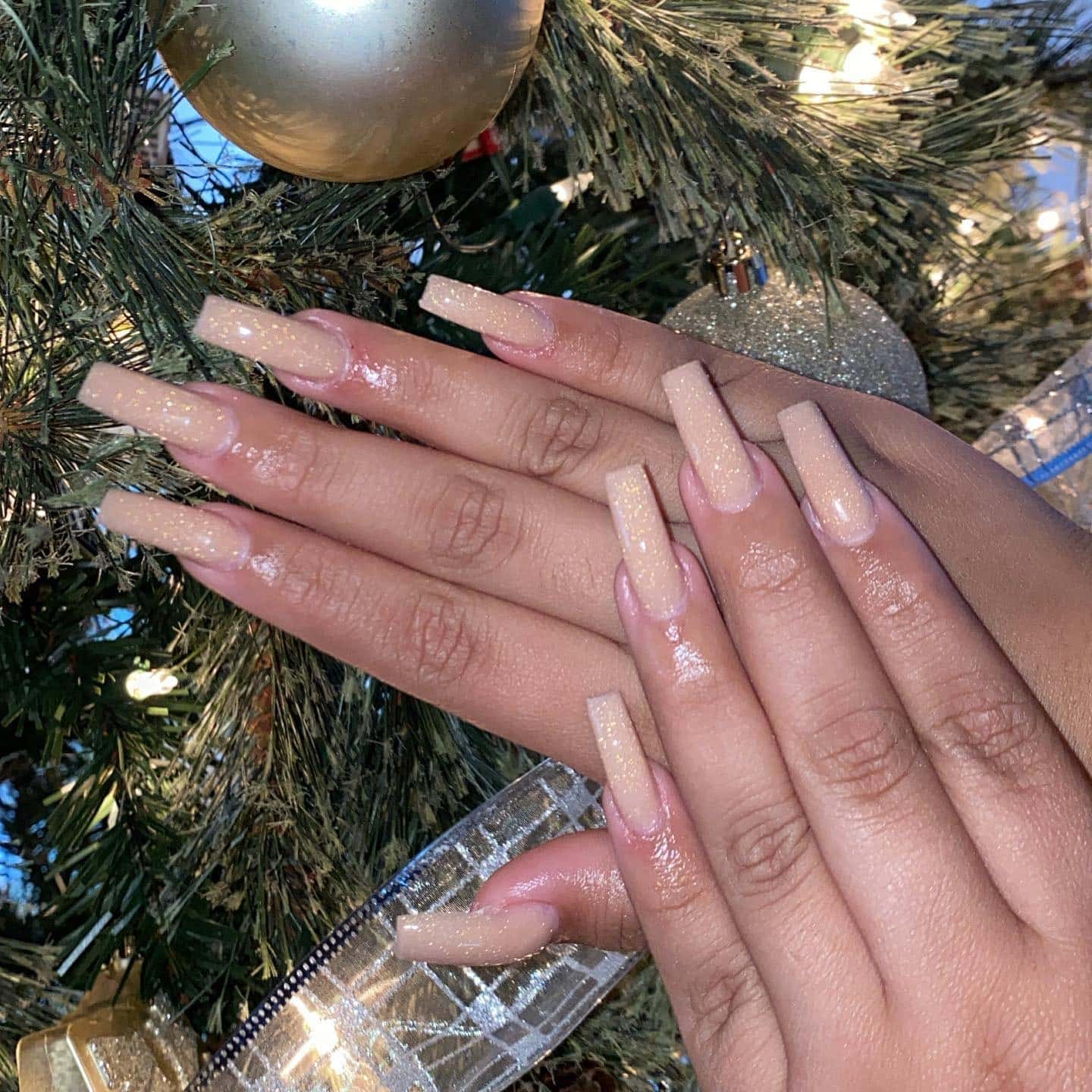 9. Champagne Glitter Long Square Nails - simple sparkly nail ideas