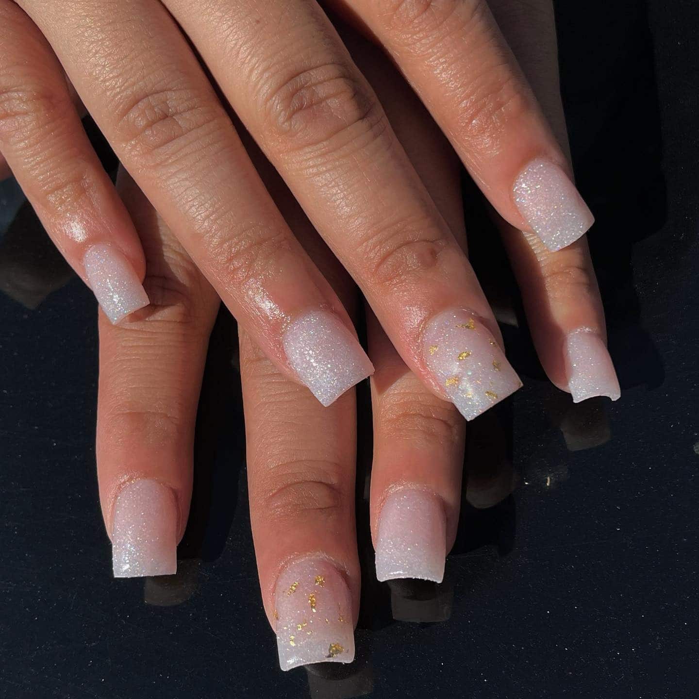 12. Milky White Glitter Square Nails with Gold Foil Accents - simple sparkly nail ideas