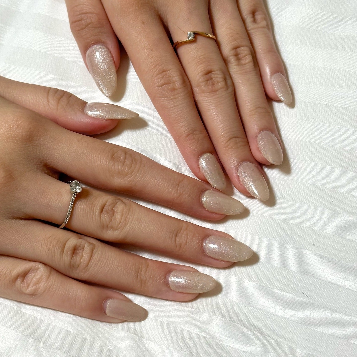 13. Champagne Shimmer Almond Nails - simple sparkly nail ideas